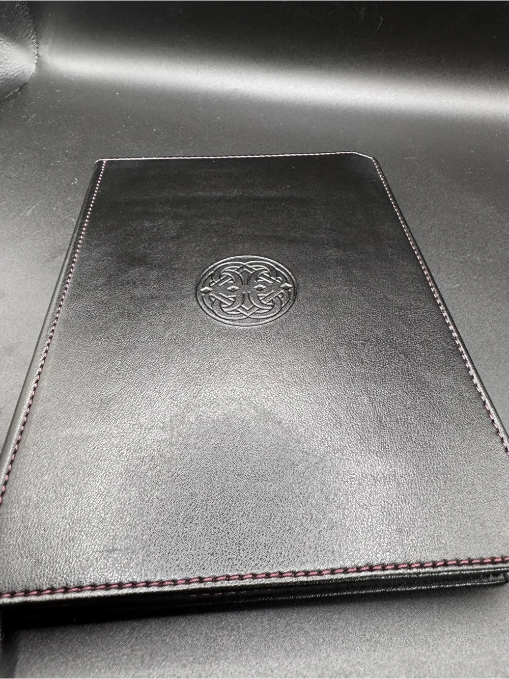 Franklin-Christoph Firma-Flex Notebook featuring a debossed circular Celtic knot
